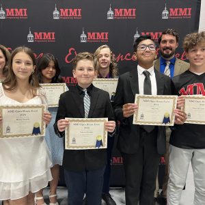 Open House Award winners Front Row (L-R): Marissa Yamulla, Nathaniel Belanger, Rian Patel, and Xavier Reymunde Wittmer. Second Row: Head of School Theresa Long, Arianna Larsen, Issac Edmonds, and Academic Dean Justin Vincent.